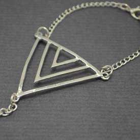 Bracelet-bague "Triangle" en métal argenté